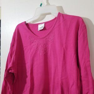 Hot pink top with sequins and embroidered neck